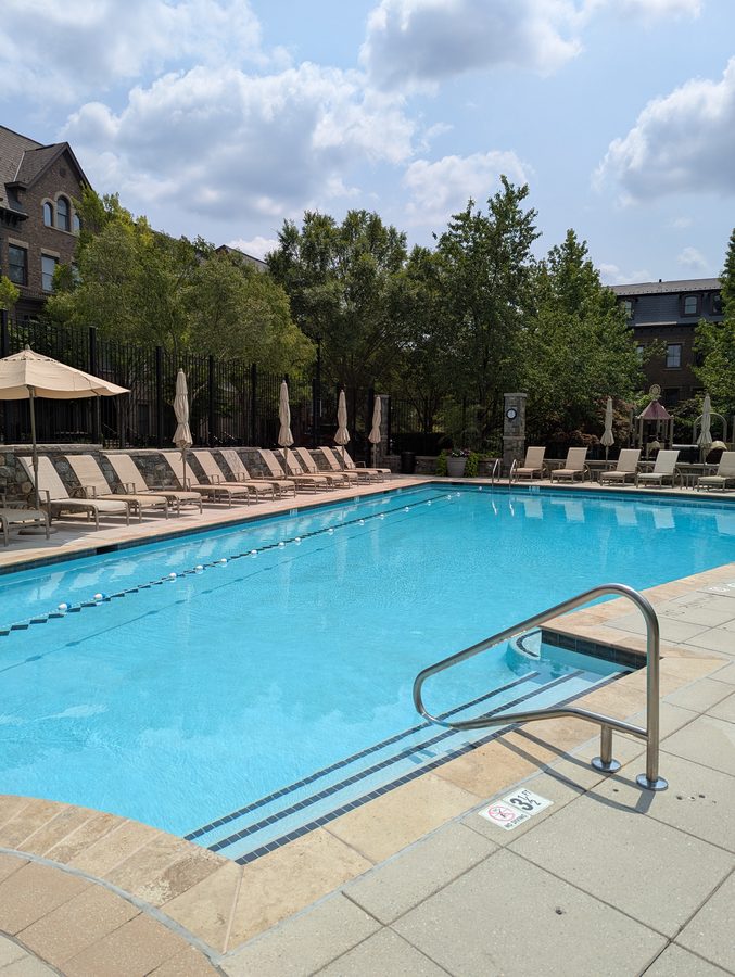 Community swimming pool and lounge area